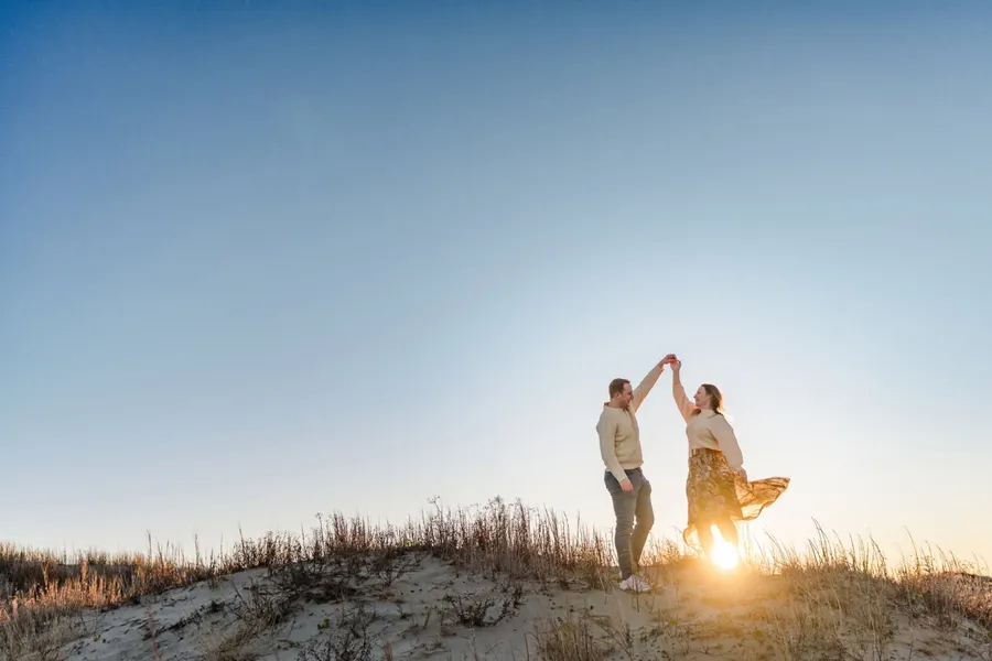 Sarah and Louis dancing on the dunes